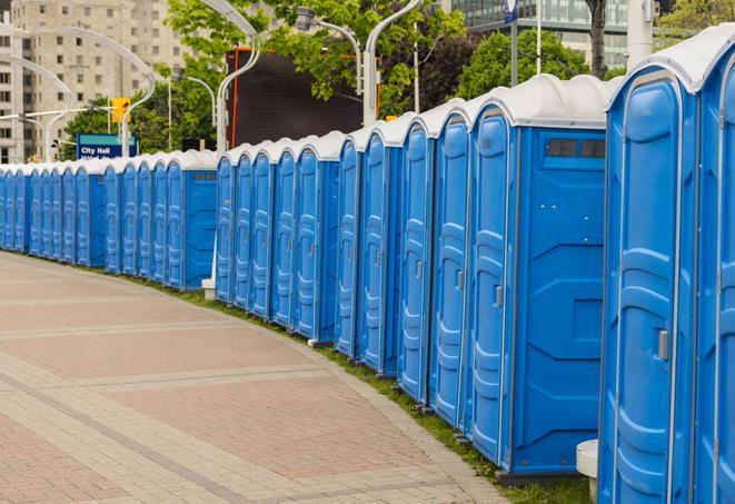 Seasonal porta potty units set up at a Topeka, Kansas venue